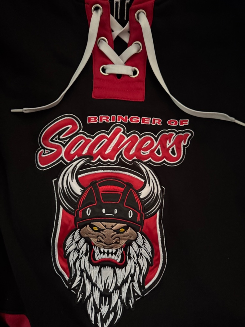 Graphic 'Bringer of Sadness' Black & Red Hockey-Style Pullover